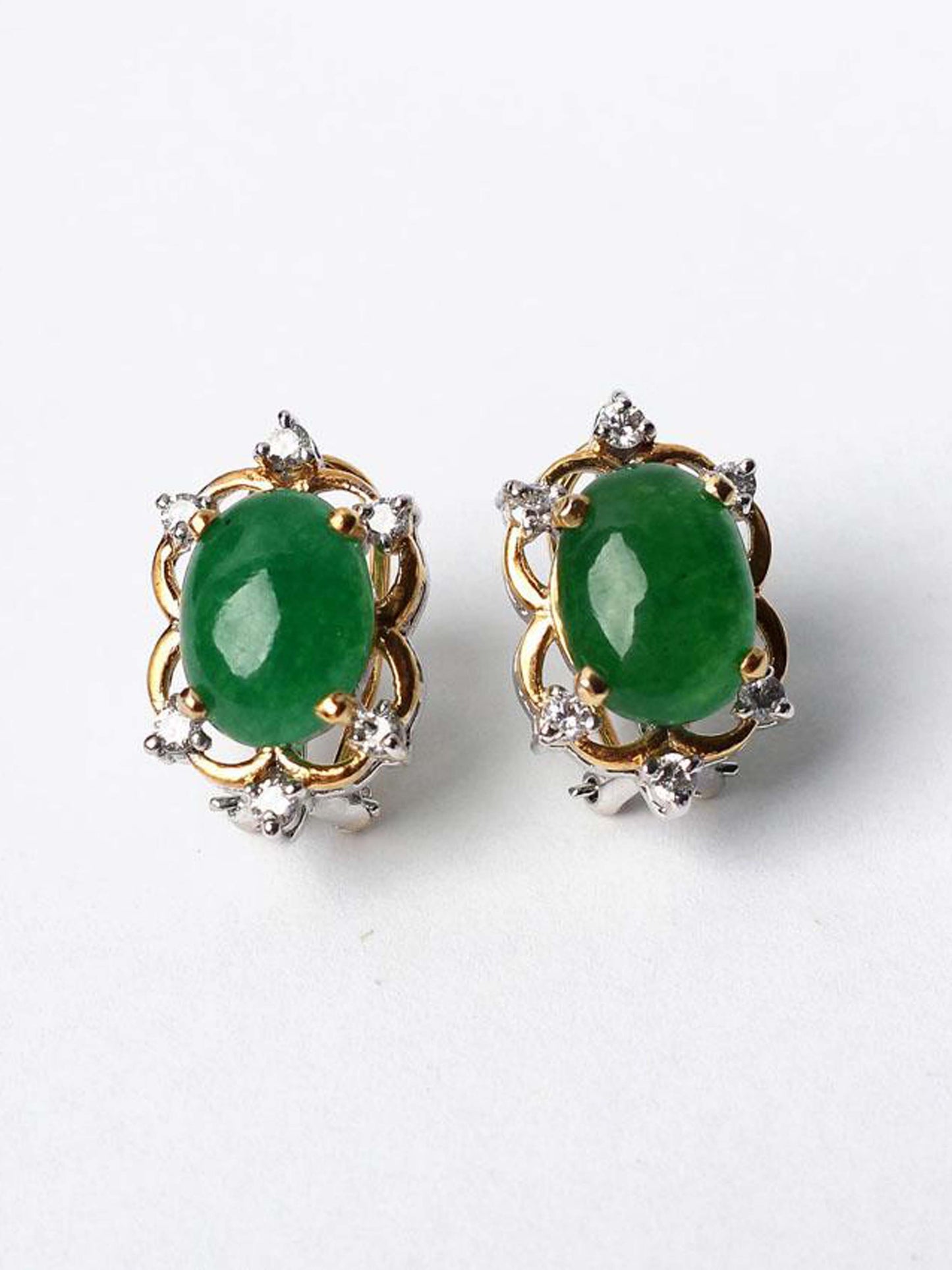 Tops Studded With Green Stone In 925 Silver.