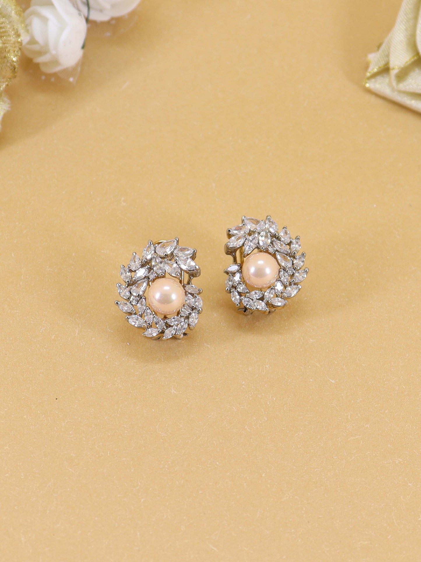 Tops Studded With Zircons And Pink Pearls In 925 Silver.