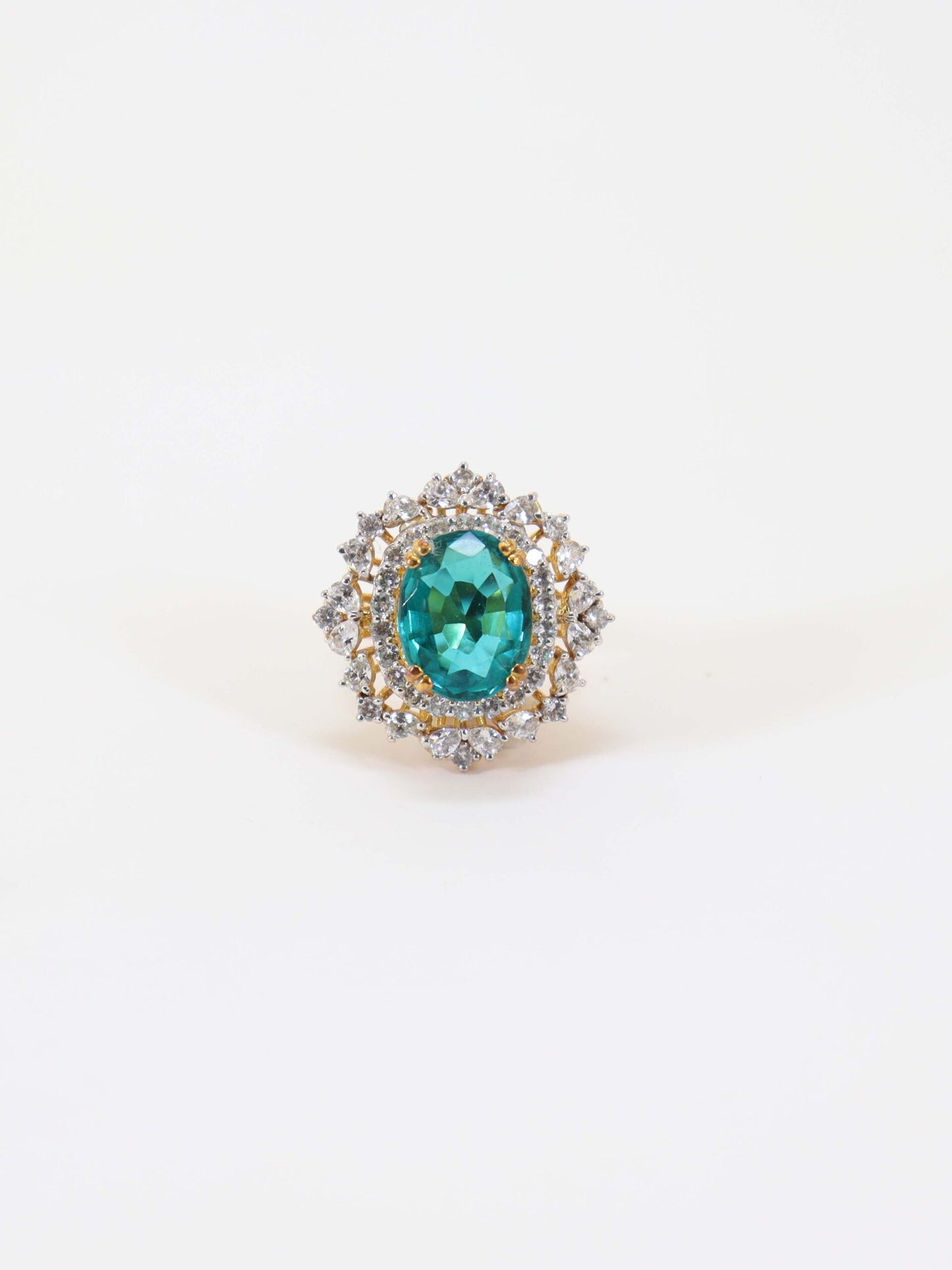 Ring Studded With Floride Color Stone In 925 Silver.