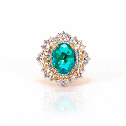 Ring Studded With Floride Color Stone In 925 Silver.