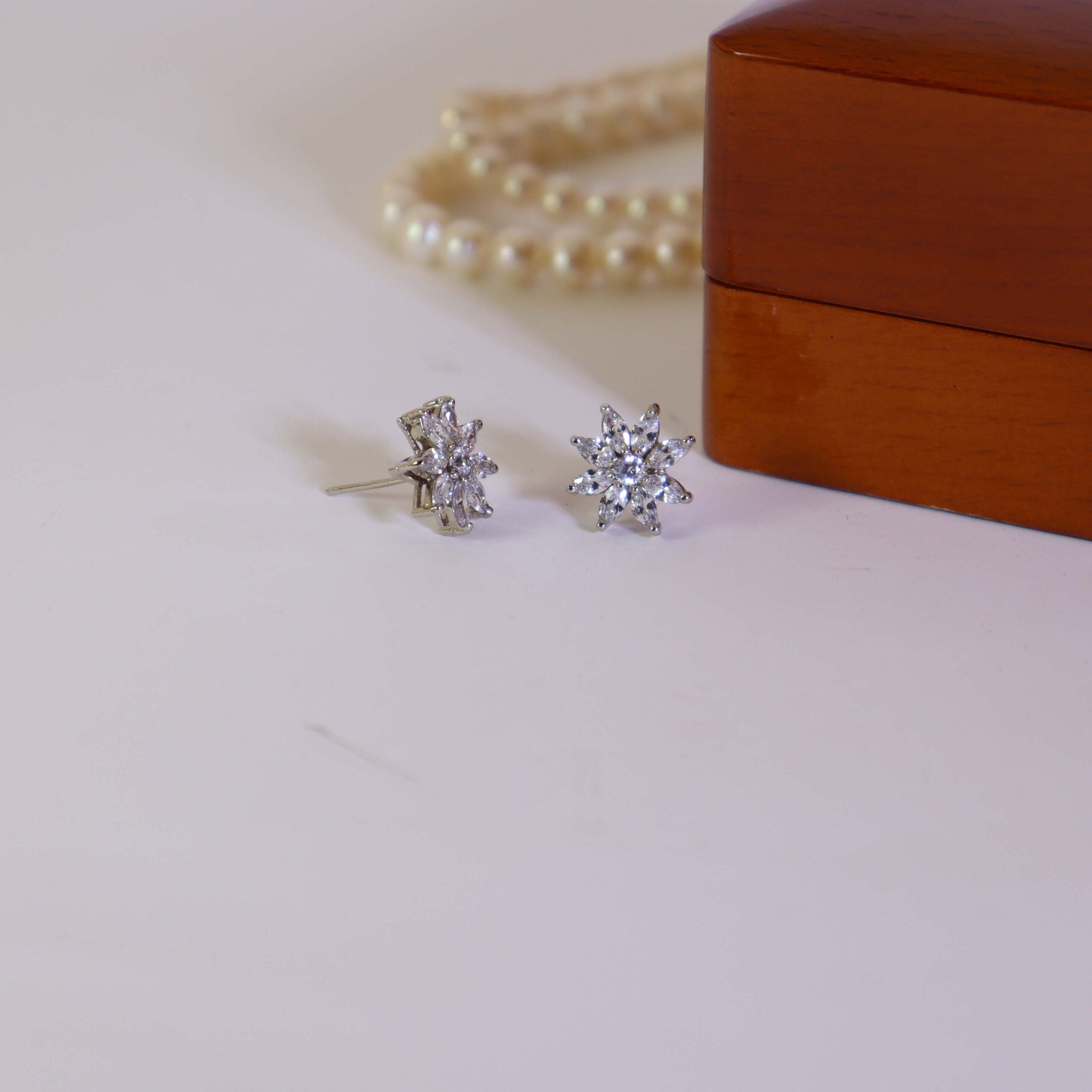 Tops Studded With Zircon In 925 Silver.
