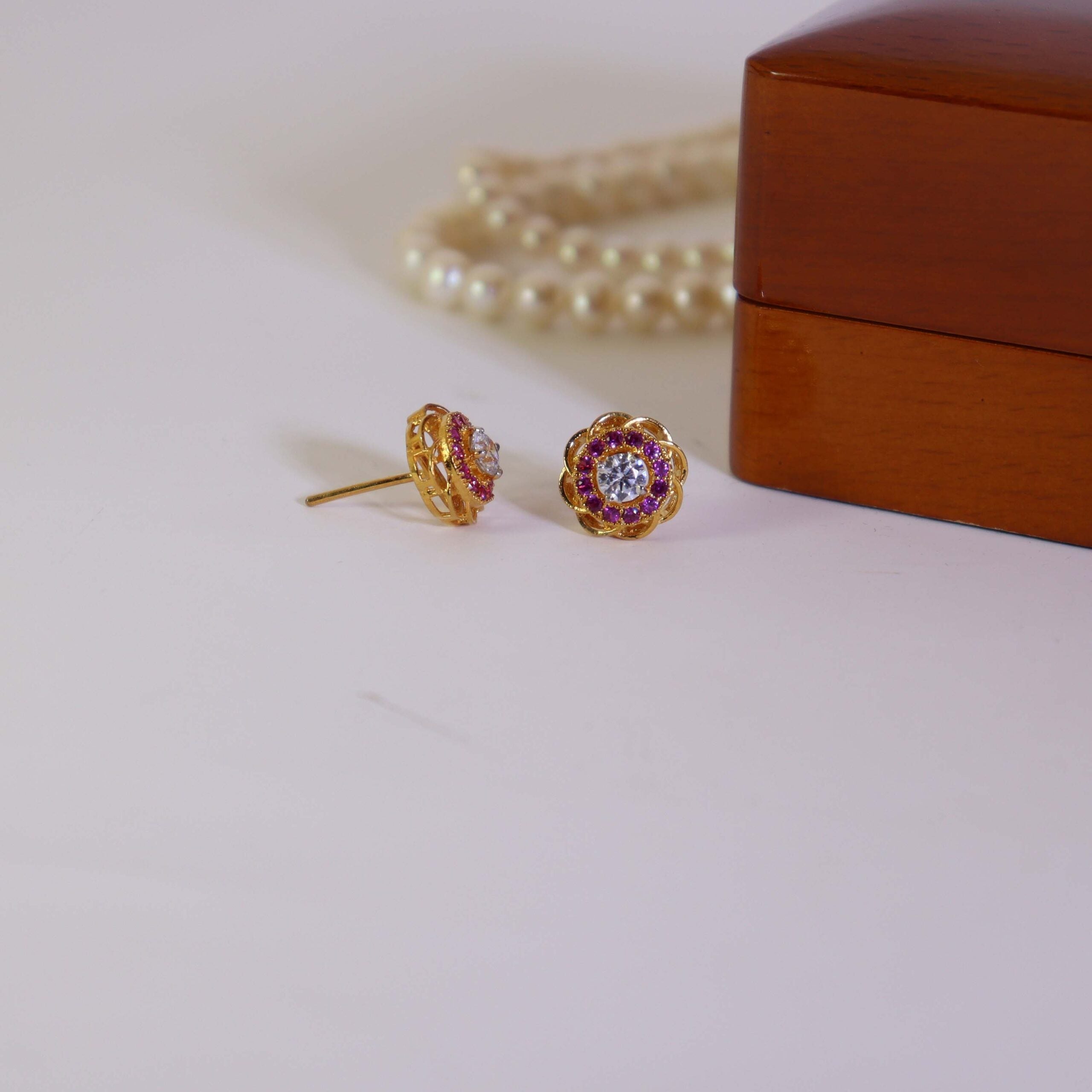 Tops Studded With Zircon And Chatham In 925 Silver.