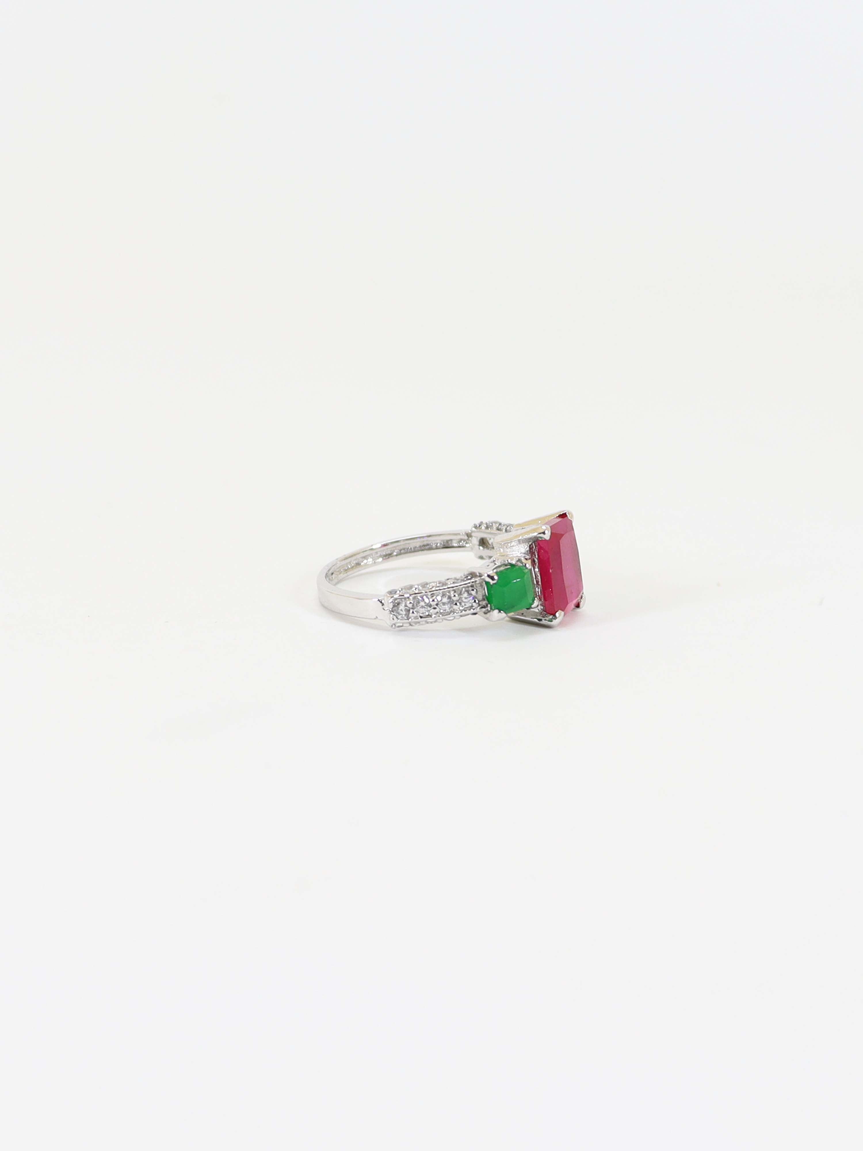 Ring Studded With Chatham And Green Zircons In 925 Silver.