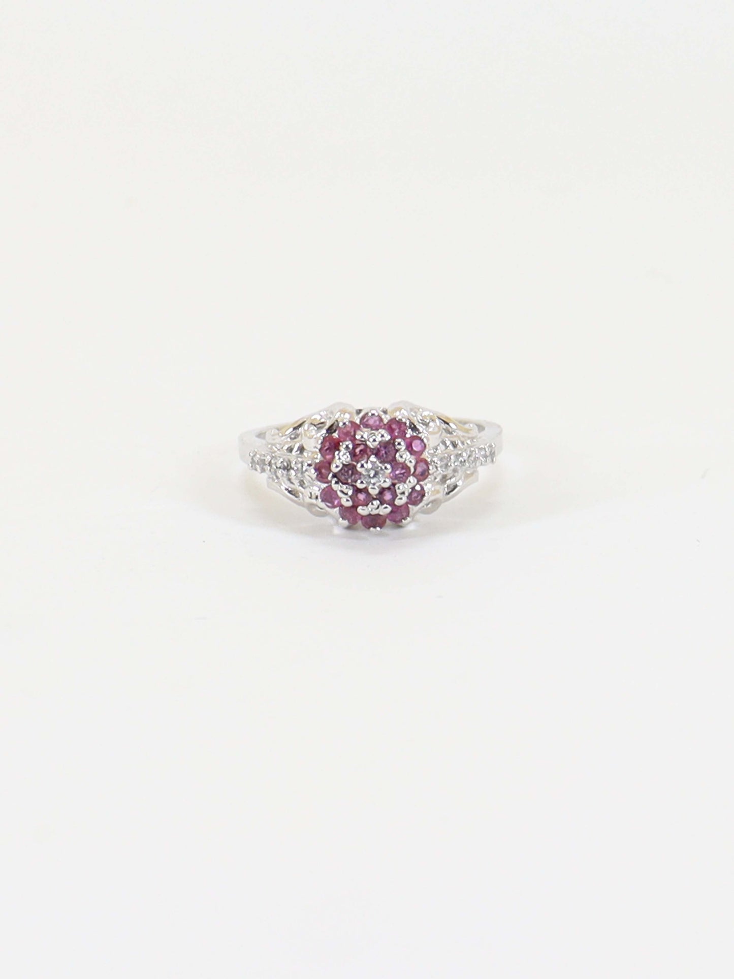 Ring Studded With Zircons And Ruby In 925 Silver.