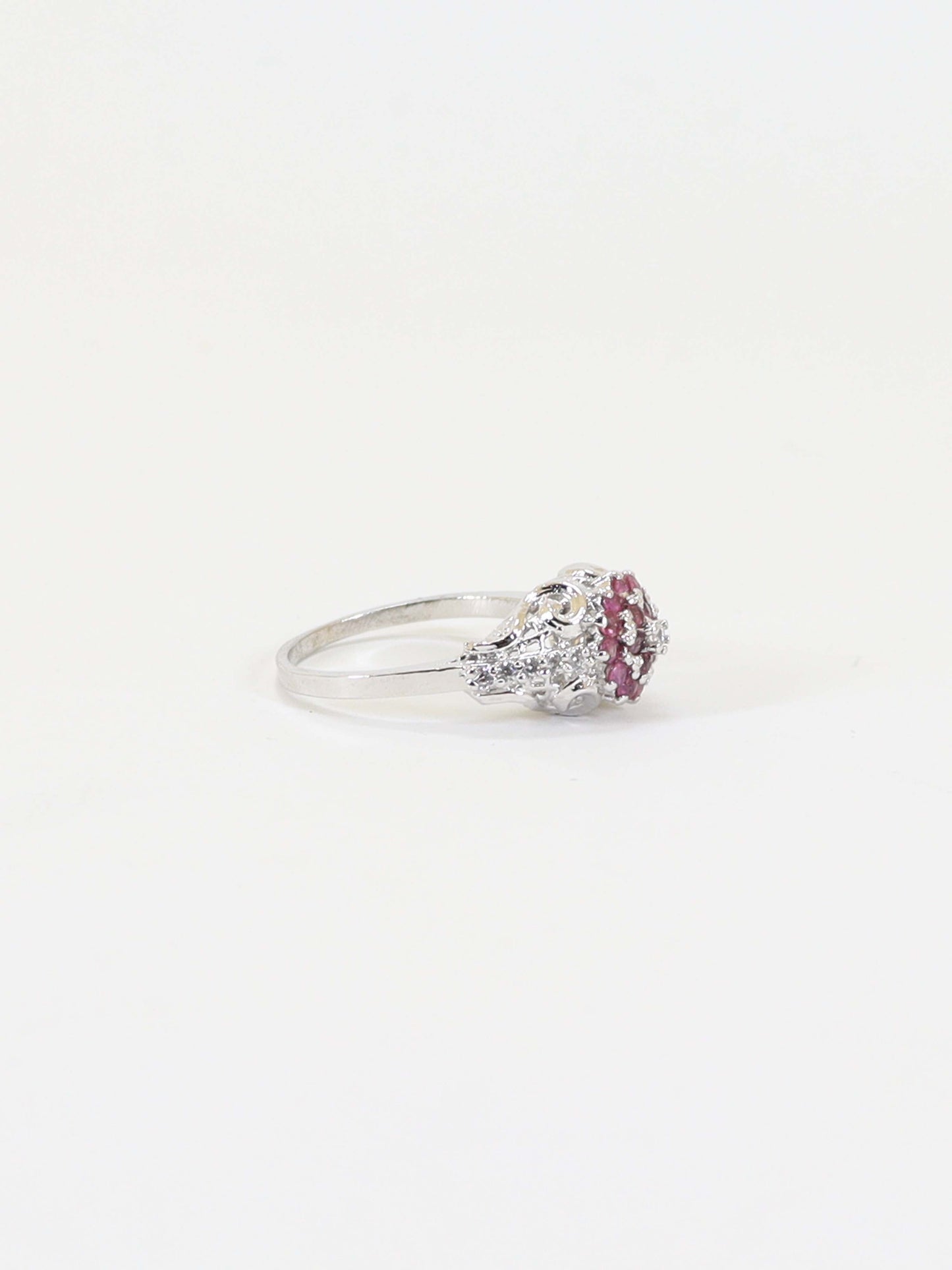 Ring Studded With Zircons And Ruby In 925 Silver.