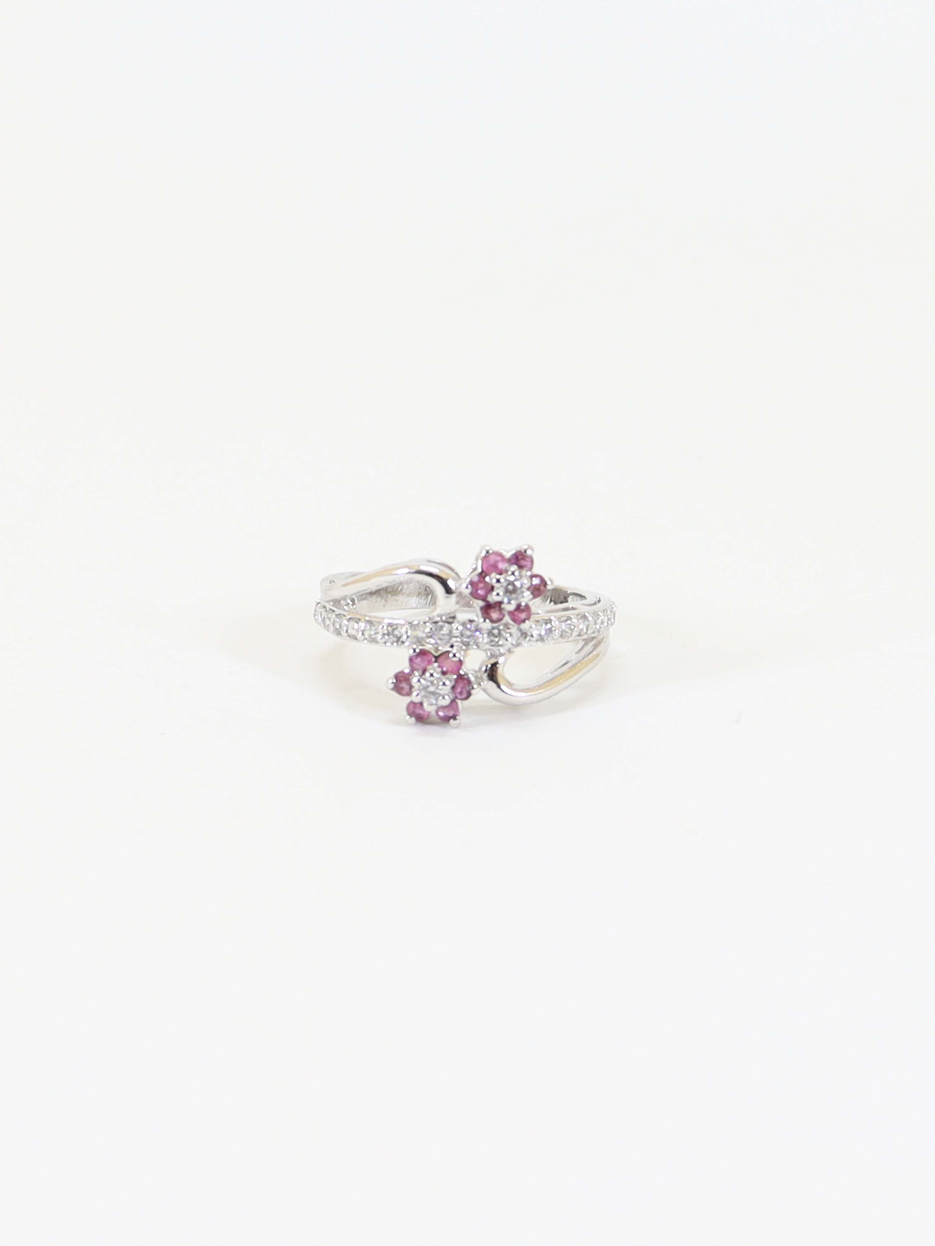 Ring Studded With Zircons And Ruby In 925 Silver.