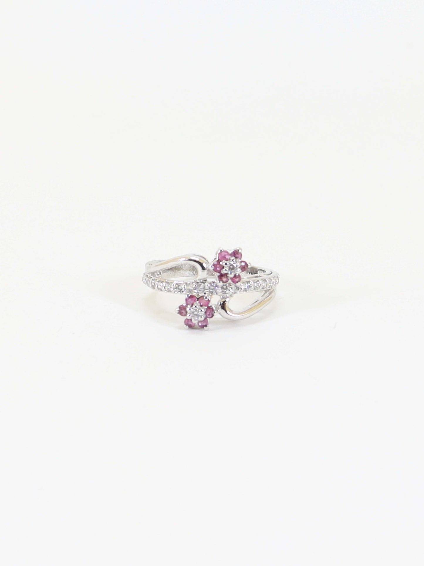 Ring Studded With Zircons And Ruby In 925 Silver.