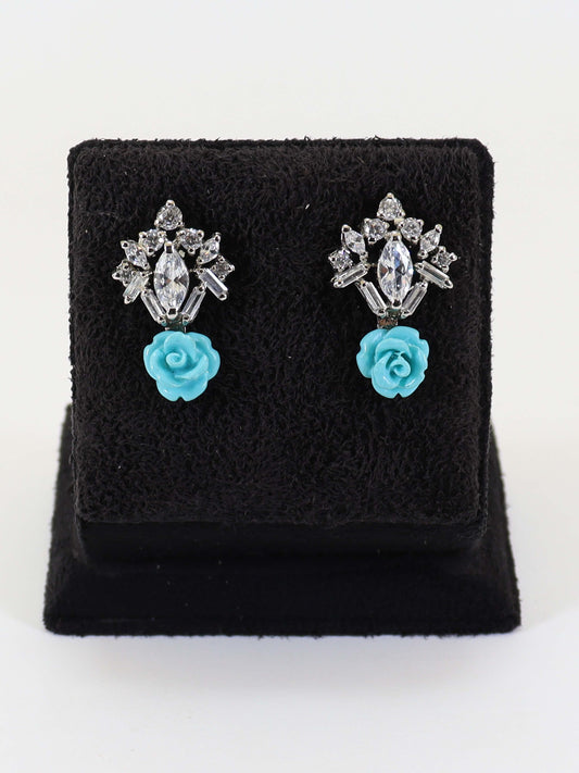 Tops With Zircons And Feerozi Colour Flower In 925 Silver.