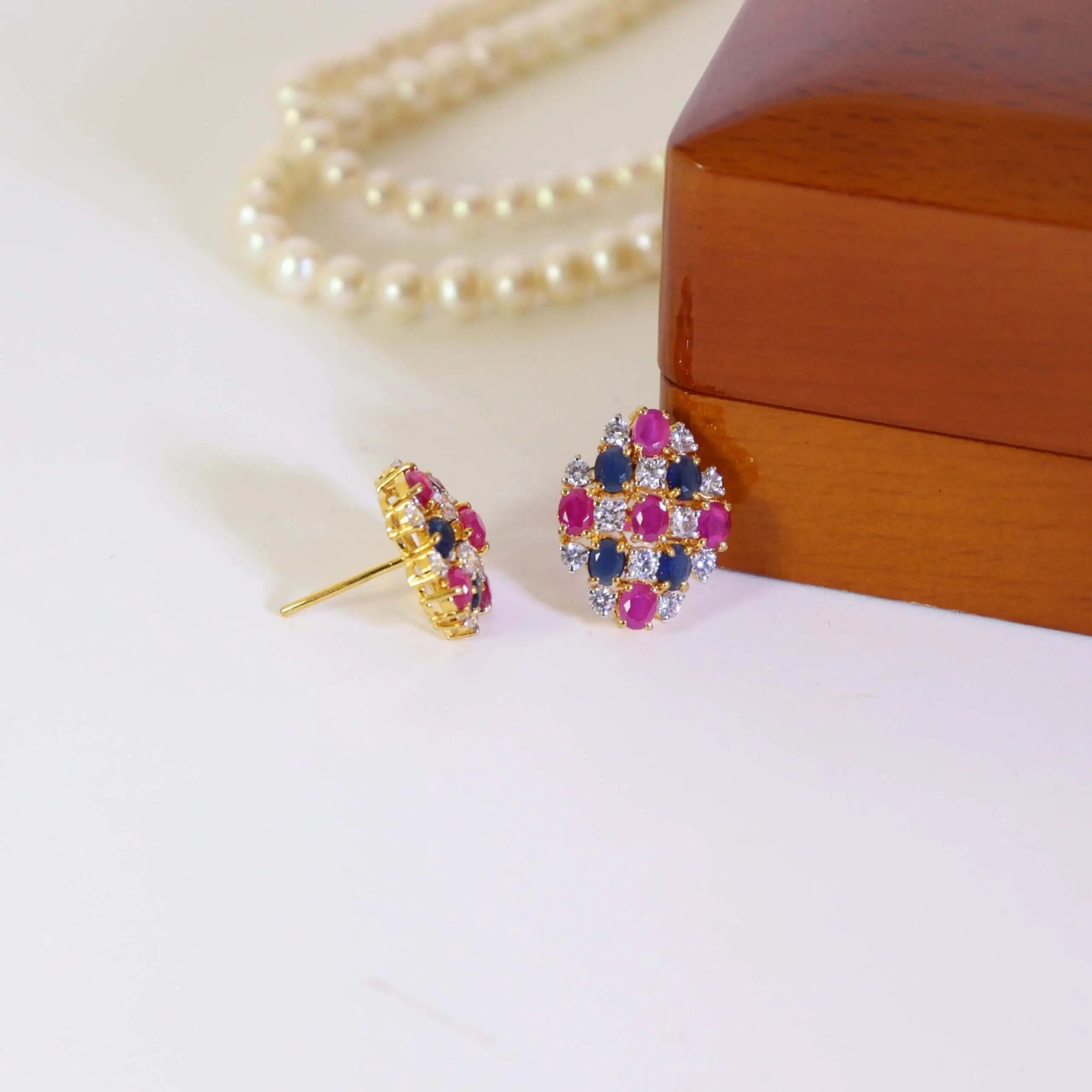 Tops Studded With Chatham And Blue Zircons In 925 Silver.