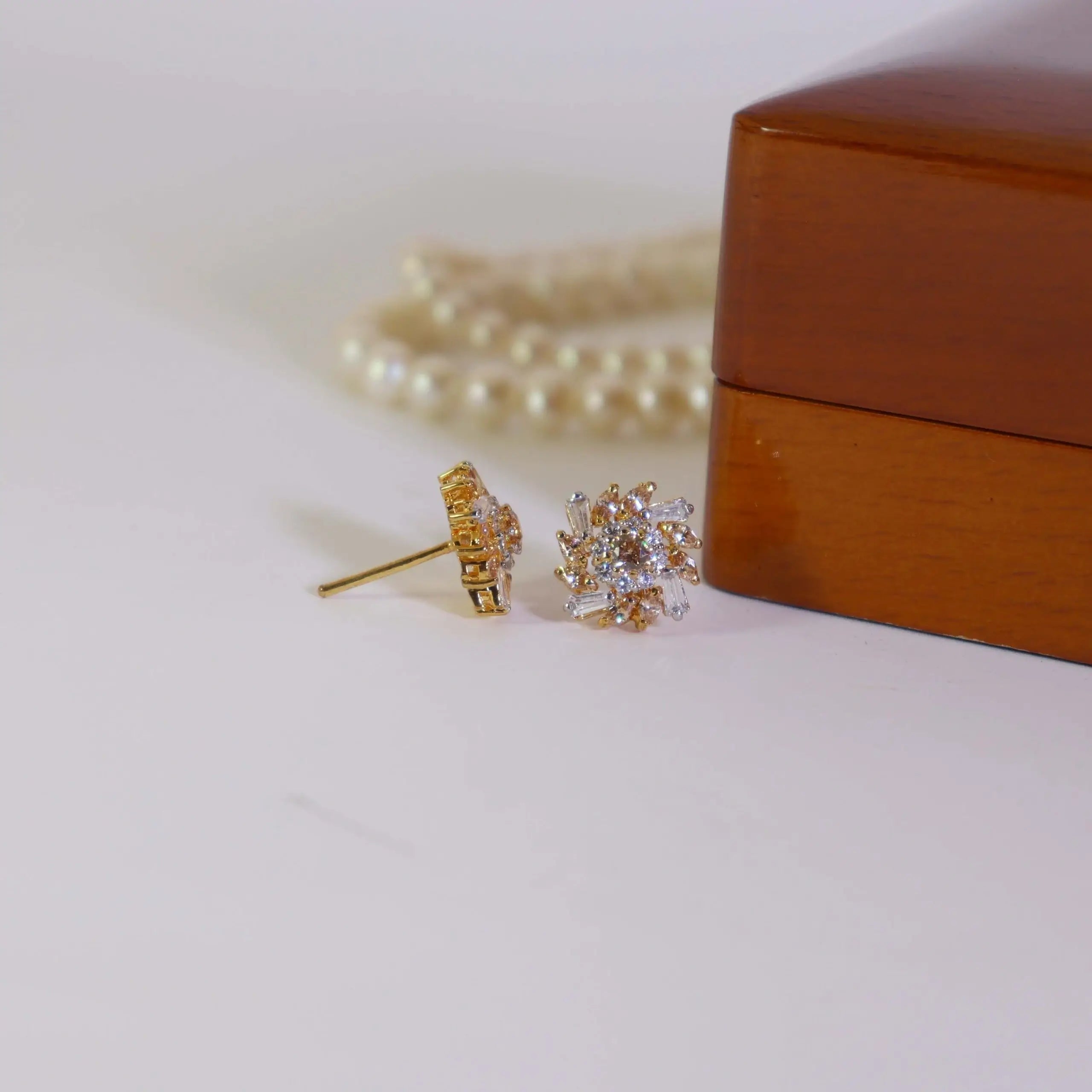 Tops Studded With Zircons And Shampaign In 925 Silver.