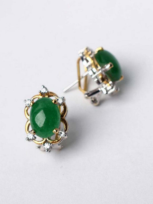 Tops Studded With Green Stone In 925 Silver.